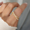 Elegant Crossed Pearl Ring
