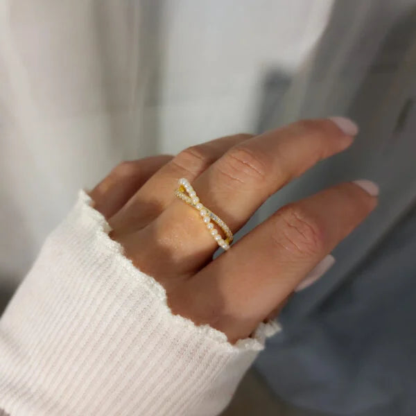 Elegant Crossed Pearl Ring