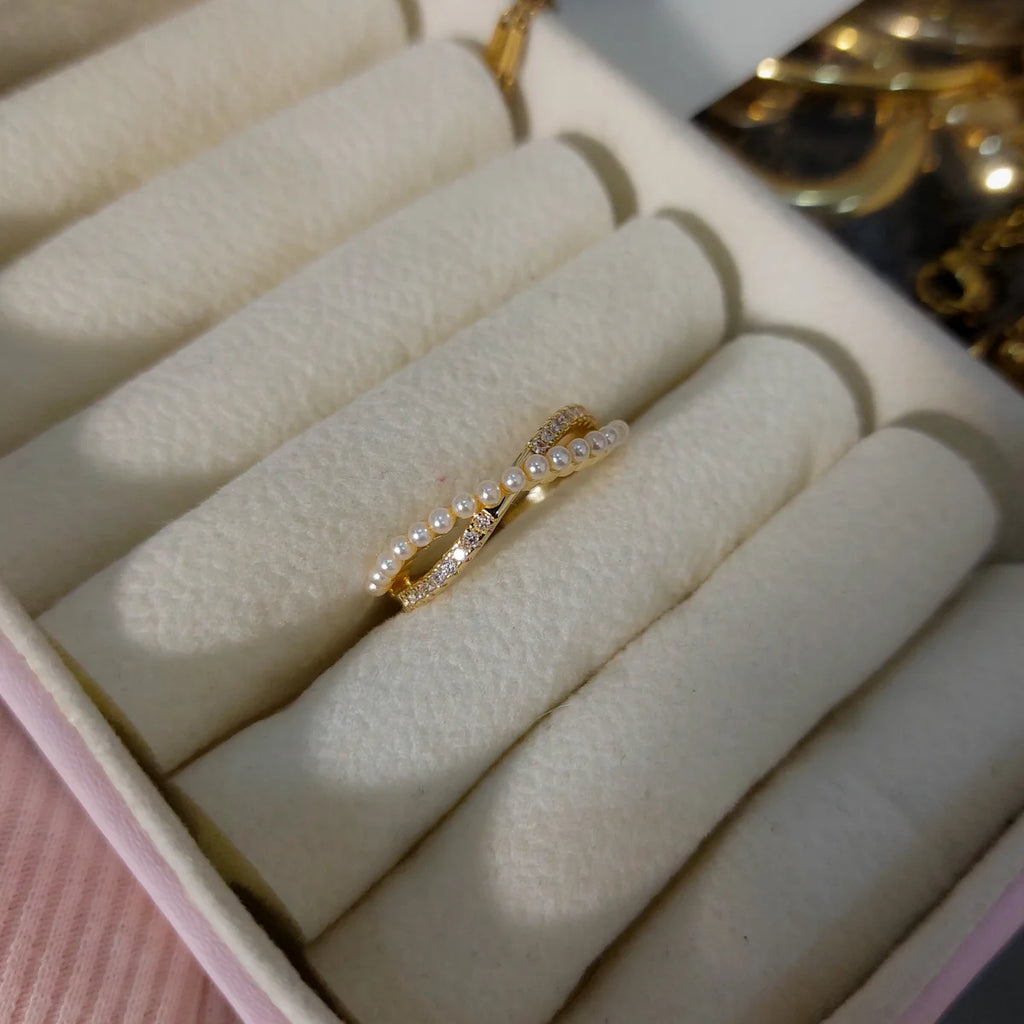Elegant Crossed Pearl Ring